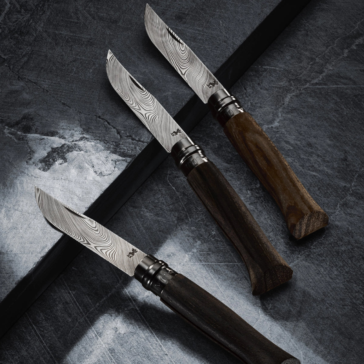 Couteau pliant Opinel N8 Damas Ziricote édition limitée ouvert lame Damasteel Coutellerie Marcin
