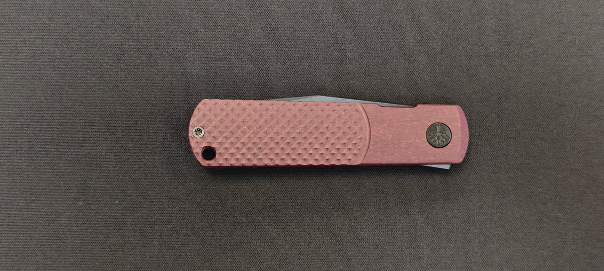 Couteau pliant Böker avec ouverture par flipper.