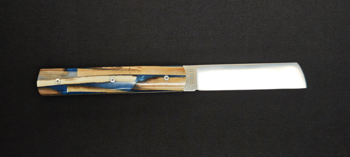 Couteau pliant Le Fidèle 20/20 associant ivoire de mammouth stabilisé et résine bleue