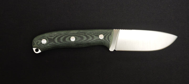 Détail du manche ergonomique en Micarta vert.