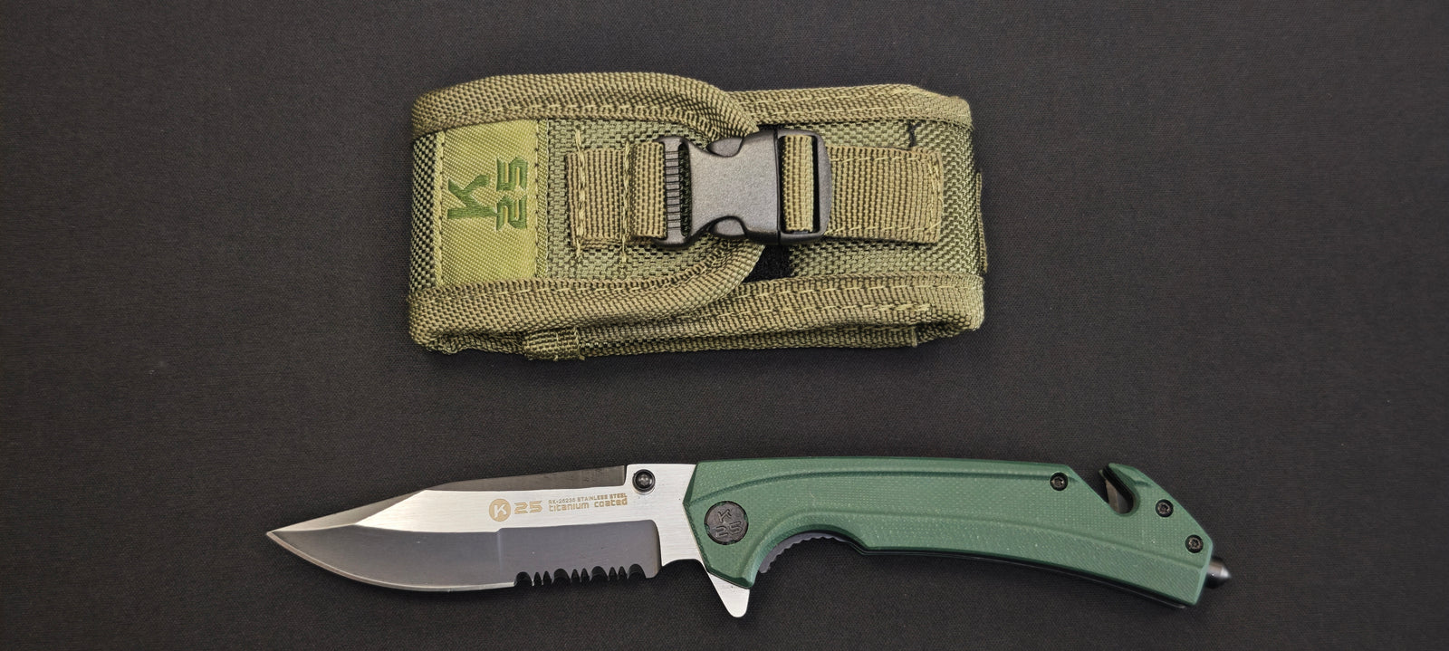 K25 - 25235 - Couteau tactique manche G10 vert lame dentée 9 cm avec coupe-ceinture