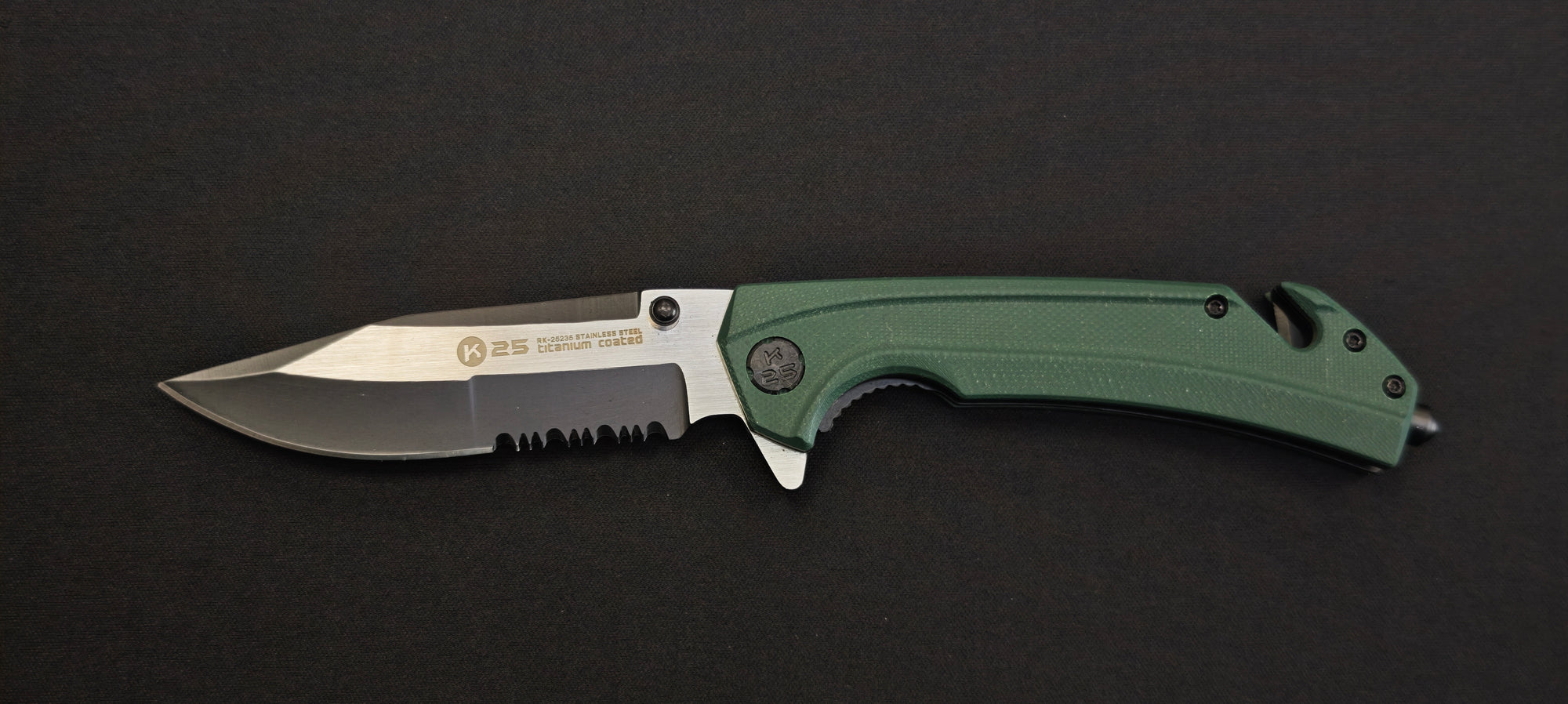 K25 - 25235 - Couteau tactique manche G10 vert lame dentée 9 cm avec coupe-ceinture
