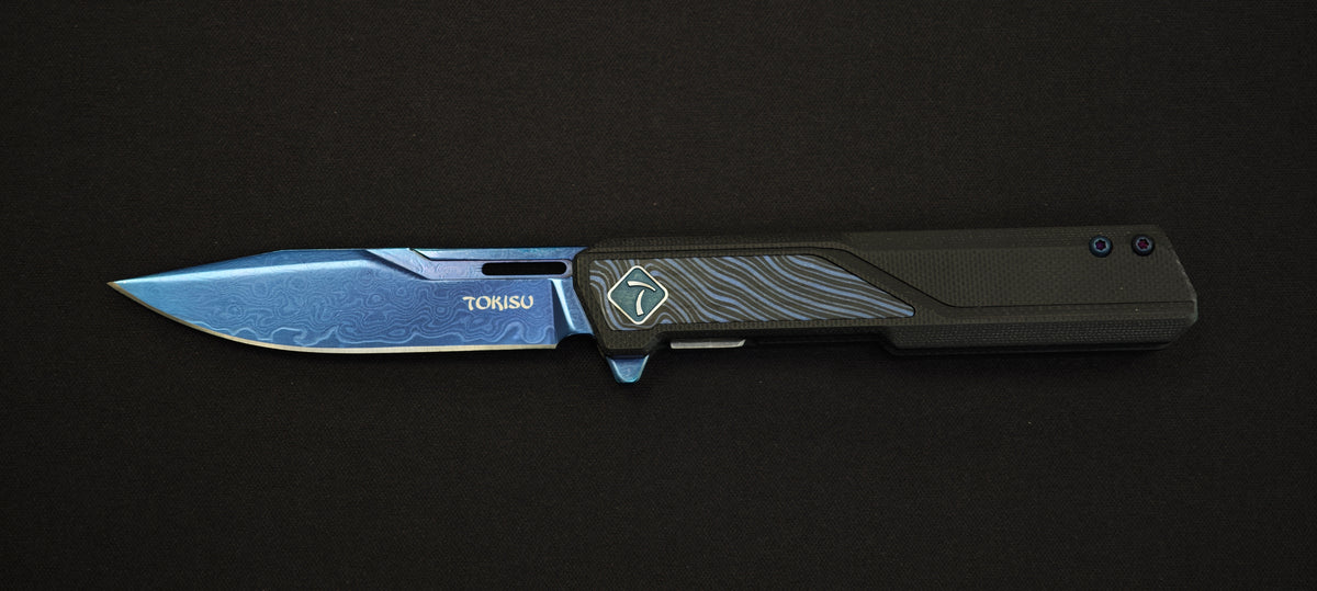 Tokisu 25020 Couteau pliant G10 Damas manche titane