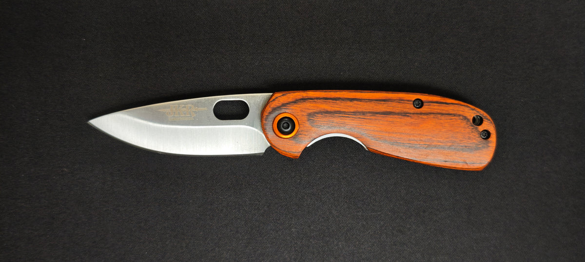 Couteau de poche JKR0660 avec manche en bois de pakka rouge-brun.