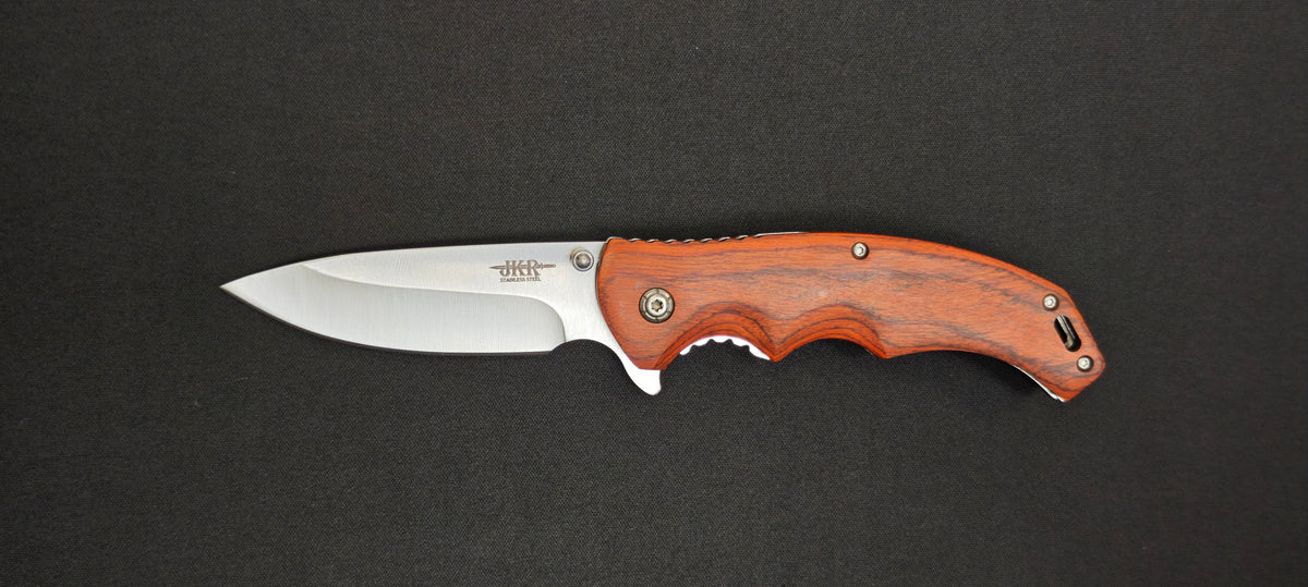 Couteau pliant JKR0903 avec manche en bois rouge.