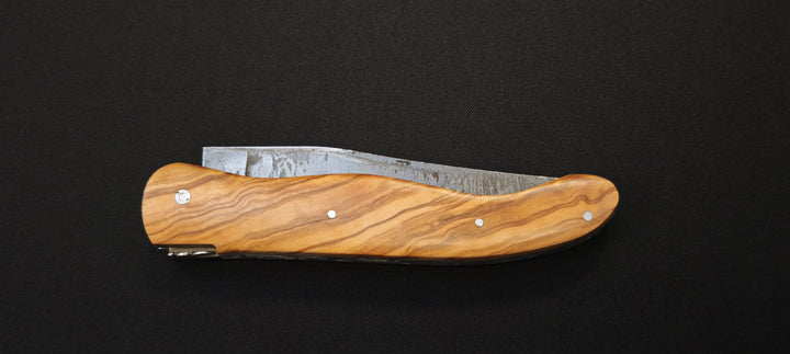 El cuchillo de caza Fidèle Laguiole mango integral de madera de olivo + hoja templada en bruto