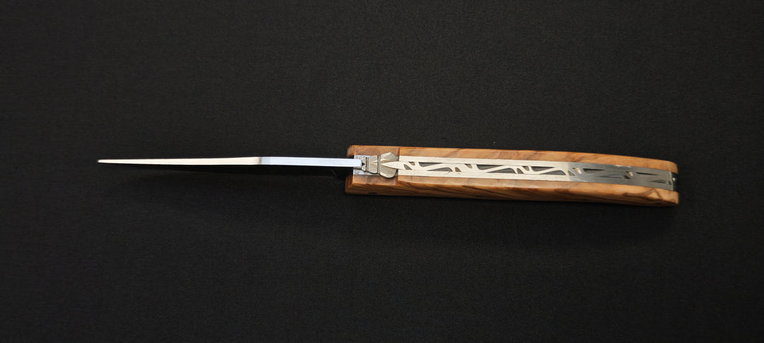 El cuchillo de caza Fidèle Laguiole mango integral de madera de olivo + hoja templada en bruto