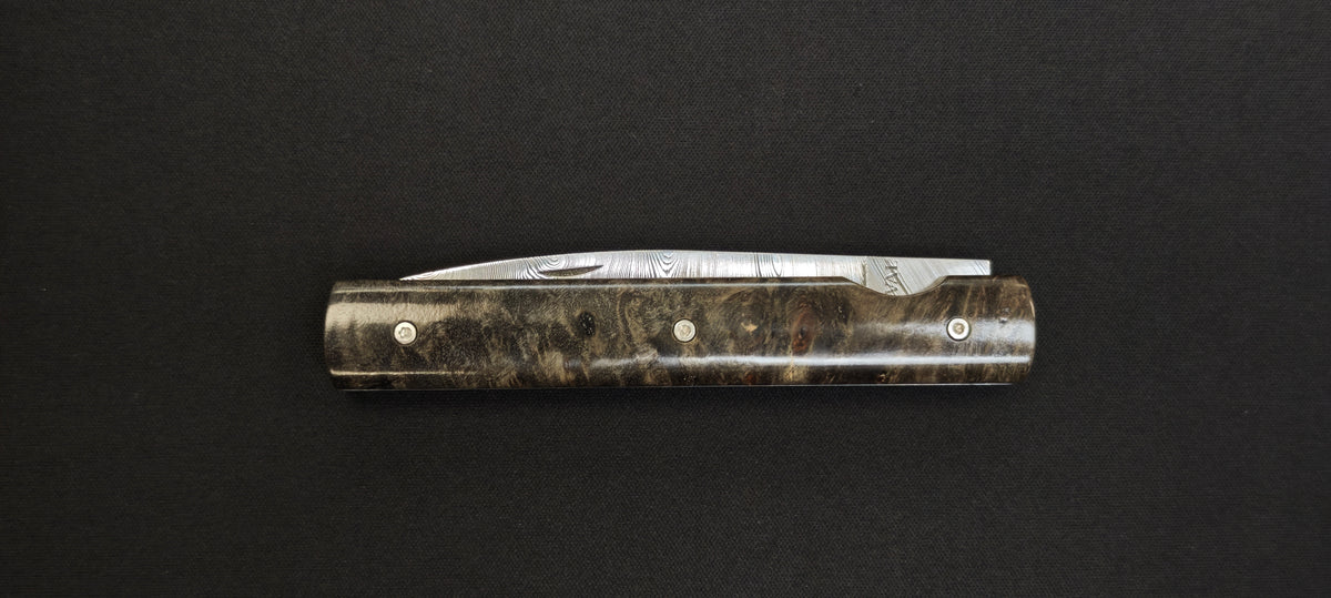 Couteau de poche Perceval avec lame Damas et manche stabilisé.