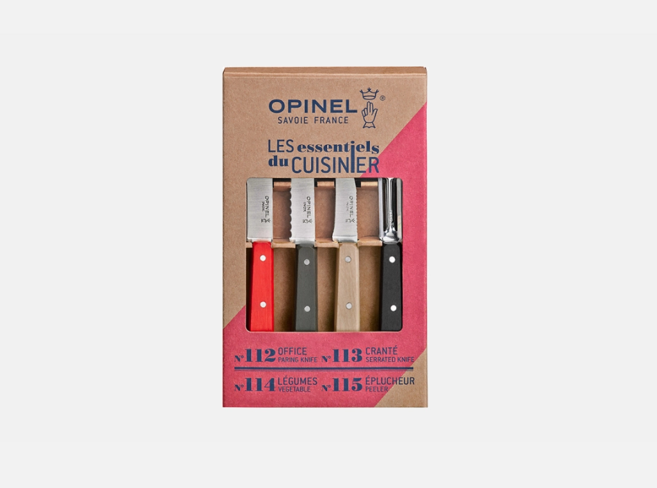 Coffret Opinel Les Essentiels Loft avec quatre outils de cuisine.