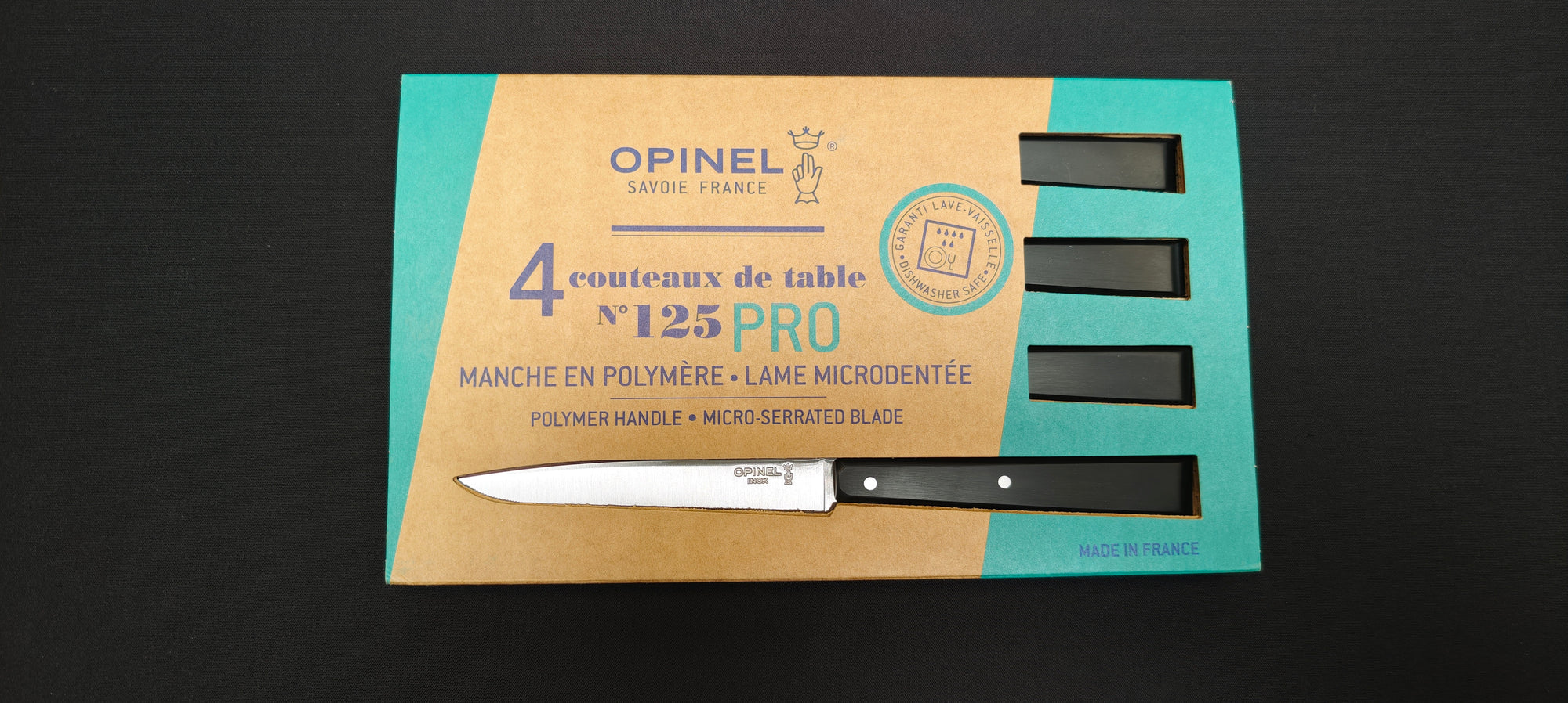 Coffret Opinel N°125 Pro avec quatre couteaux de table microdentés.