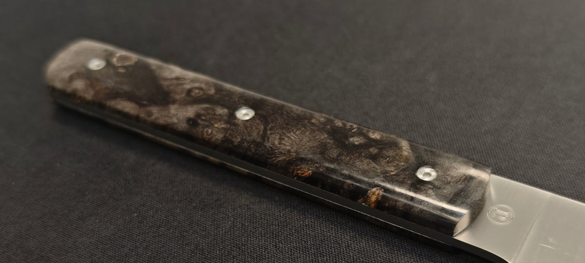 Détail du manche en bouleau noir stabilisé du Perceval 9.47 Office 10.
