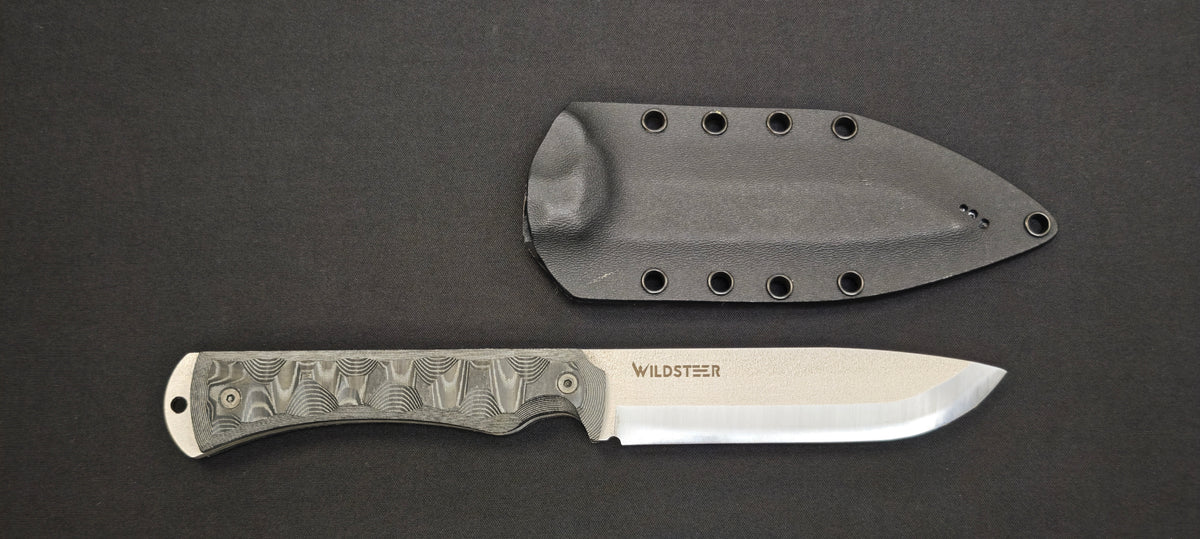 Manche micarta noir toxifié du Wildsteer CTE.